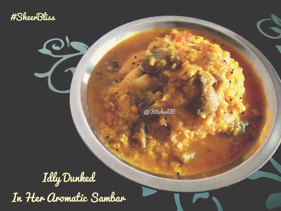 Idly dunked in Sambar
